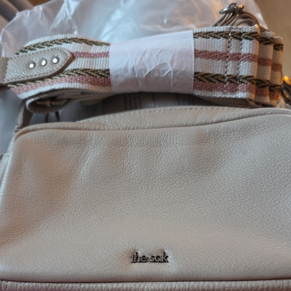 The Sak Sand/Blush Colored Textured Bag with Patterned Strap And Solid Strap
